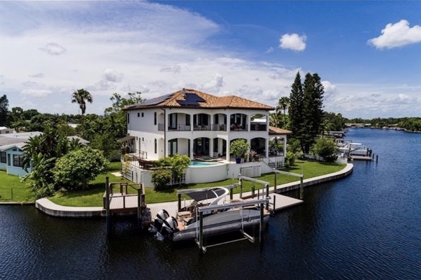 Custom Coastal Construction waterfront custom home in Florida